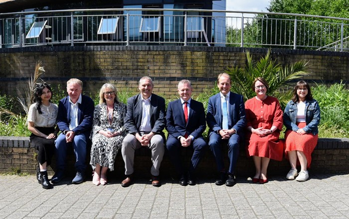 Left to right: Jan Delos Santos, Russell Grigg, Debbie Jones, Andy Townsend, Jeremy Miles MS, Professor Paul Boyle, Professor Elwen Evans KC, Elinor Banks. 