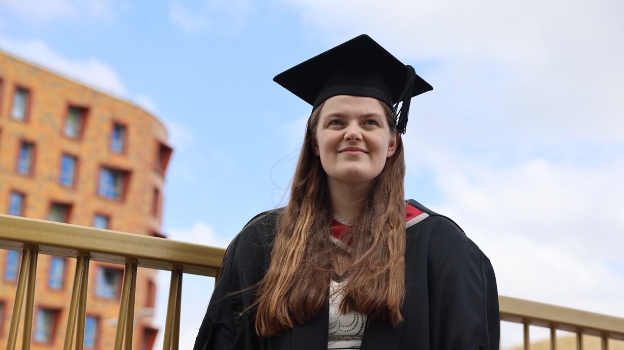 Karen Armitage in her graduation cap and gown.