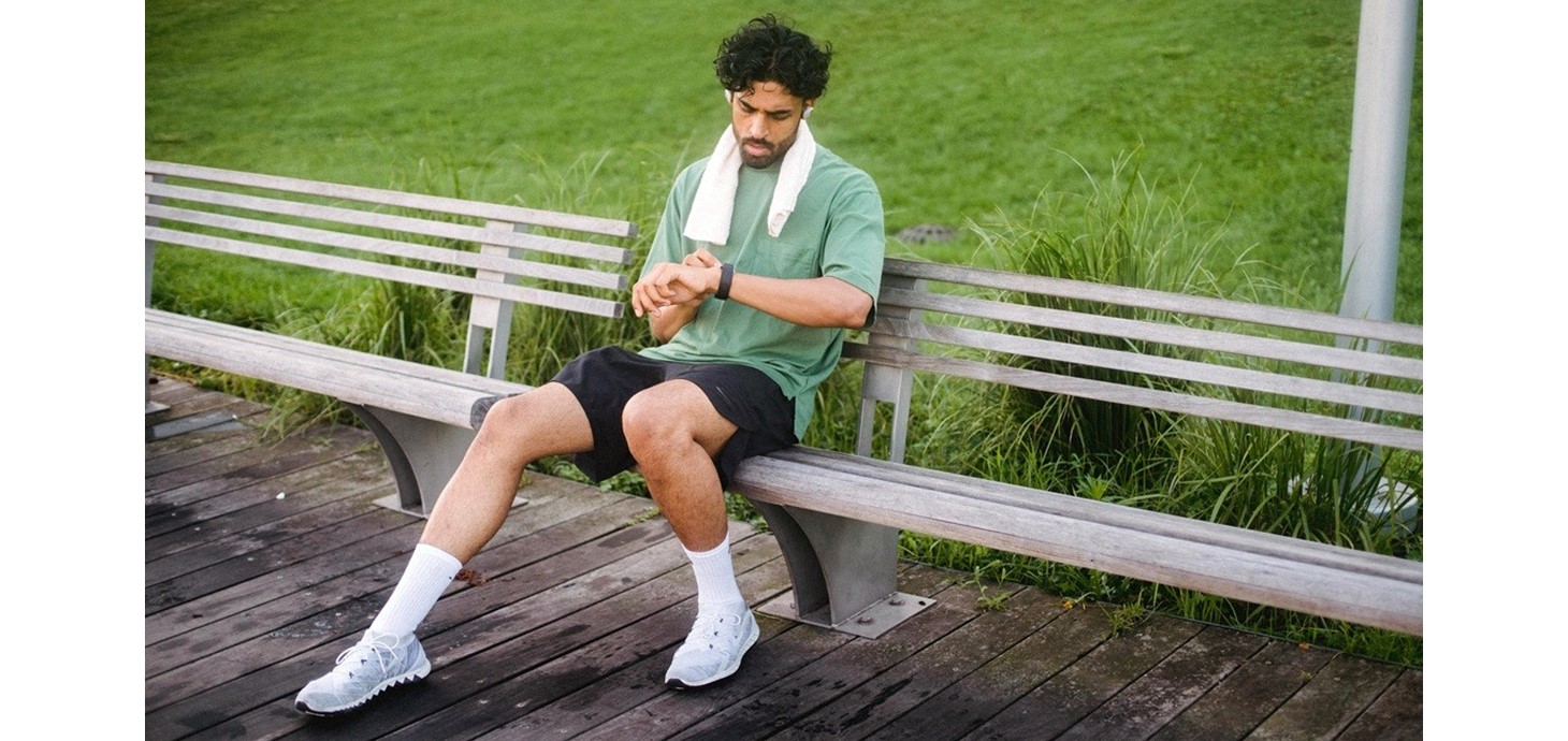 A man checking his fitness tracker after exercise: a Swansea sociologist has been honoured by the journal Current Sociology for his new research into self-optimisation, which is a term for ideas and practices aimed at continuous enhancement. Credit: Ketut Subiyanto, Pexels