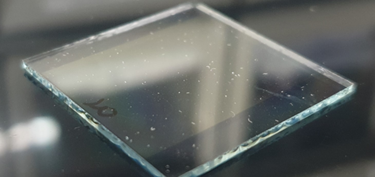 Partially made planar perovskite solar cell with dust deposited 