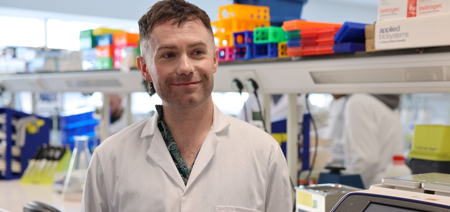 Man wearing white coat in a laboratory