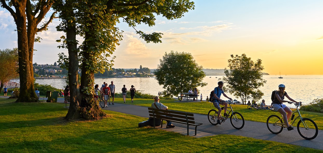 Young people biking, and walking at Stanley Park