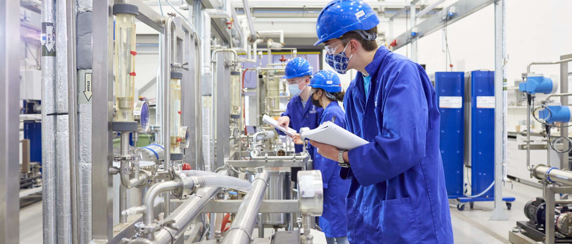 chemical engineering students in a lab