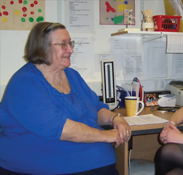 A woman at a GP surgery