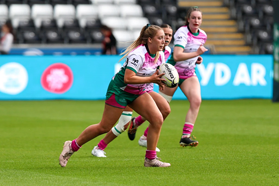 image of women playing rugby