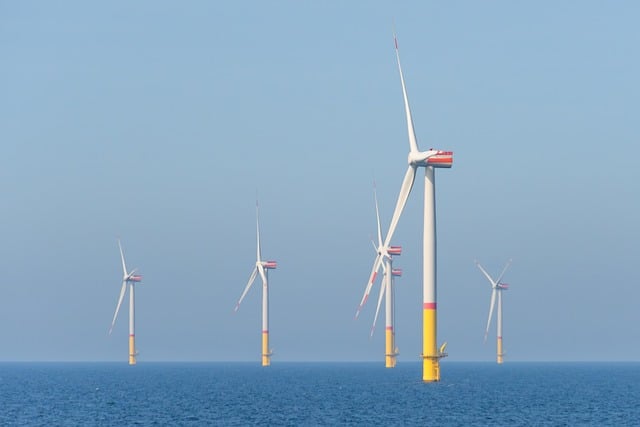 An image of wind turbines in the sea.