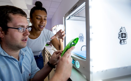 Two people working in a lab