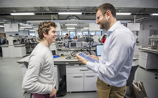 Academic talking to student