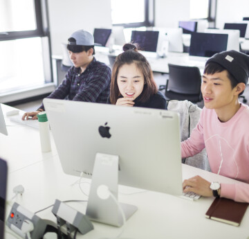 Students looking at a computer screen