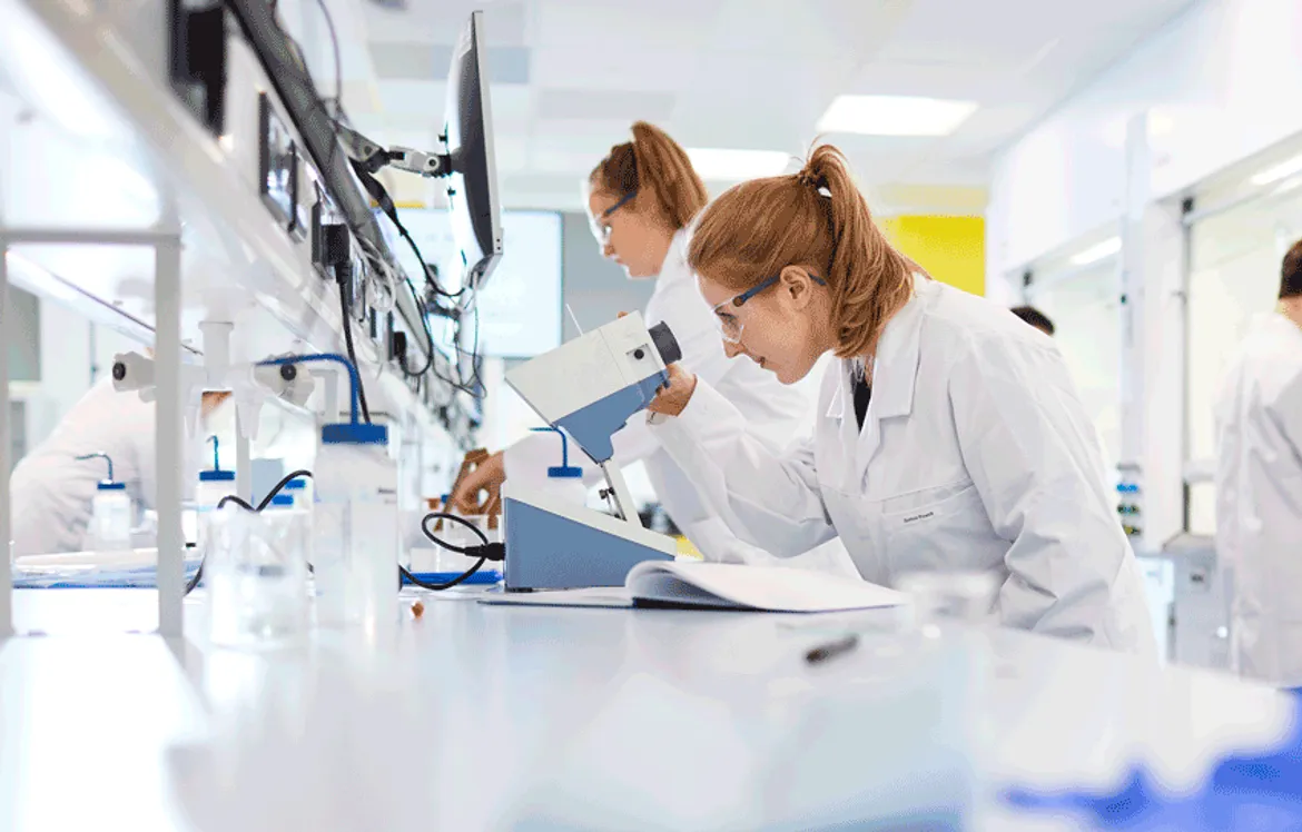 Girl at Microscope