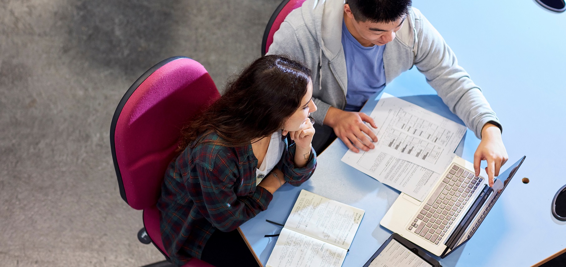 Students doing research on computers