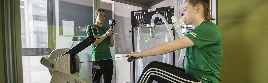 Students using sports science testing equipment