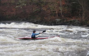 Toby Peyton- Jones kayaking during event in Scotland. 