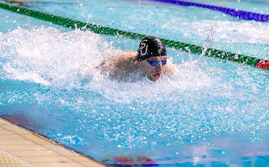 A male swimmer competing at BUCS long course weekend