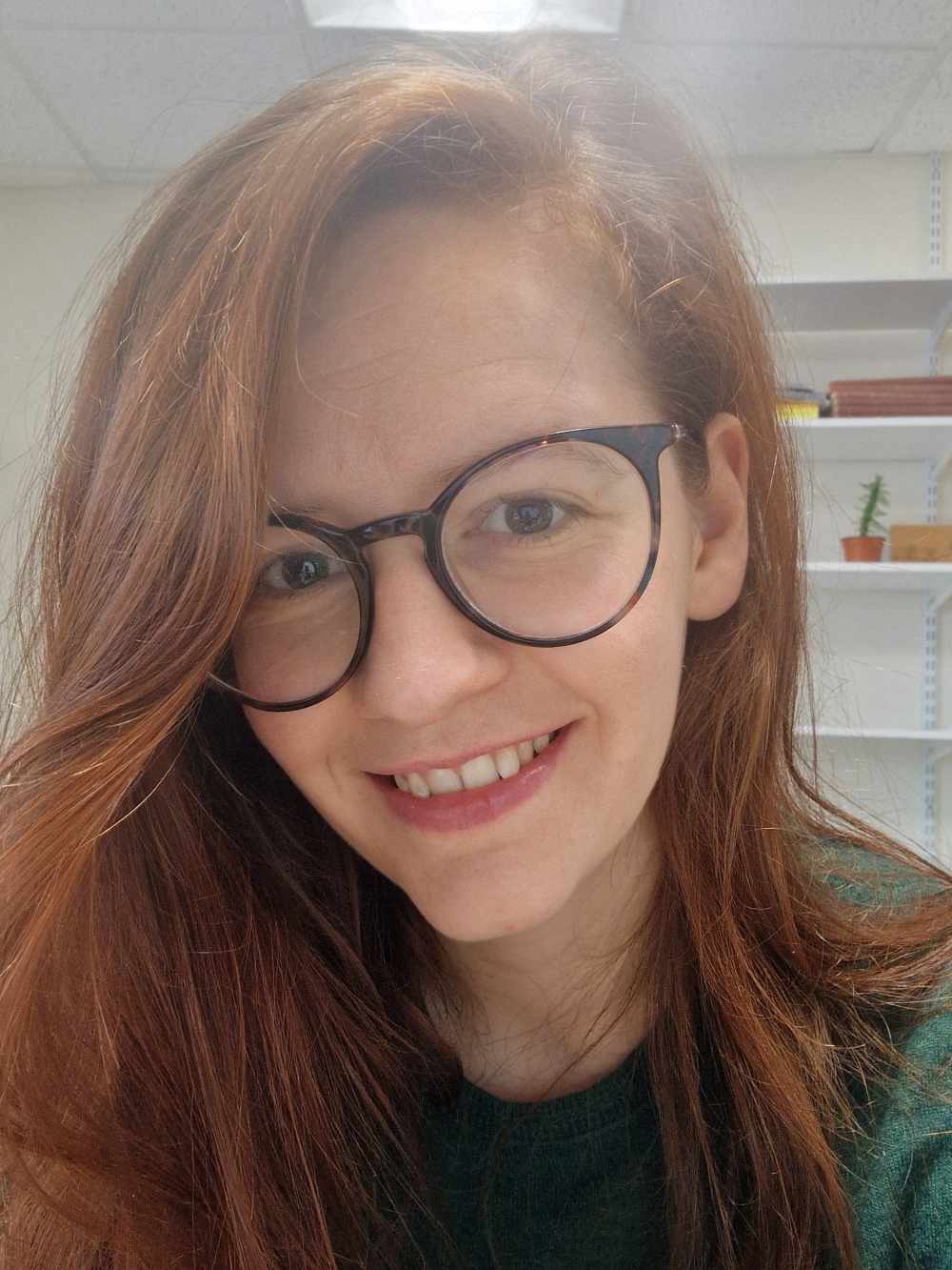 Headshop photo of Meinir in her office