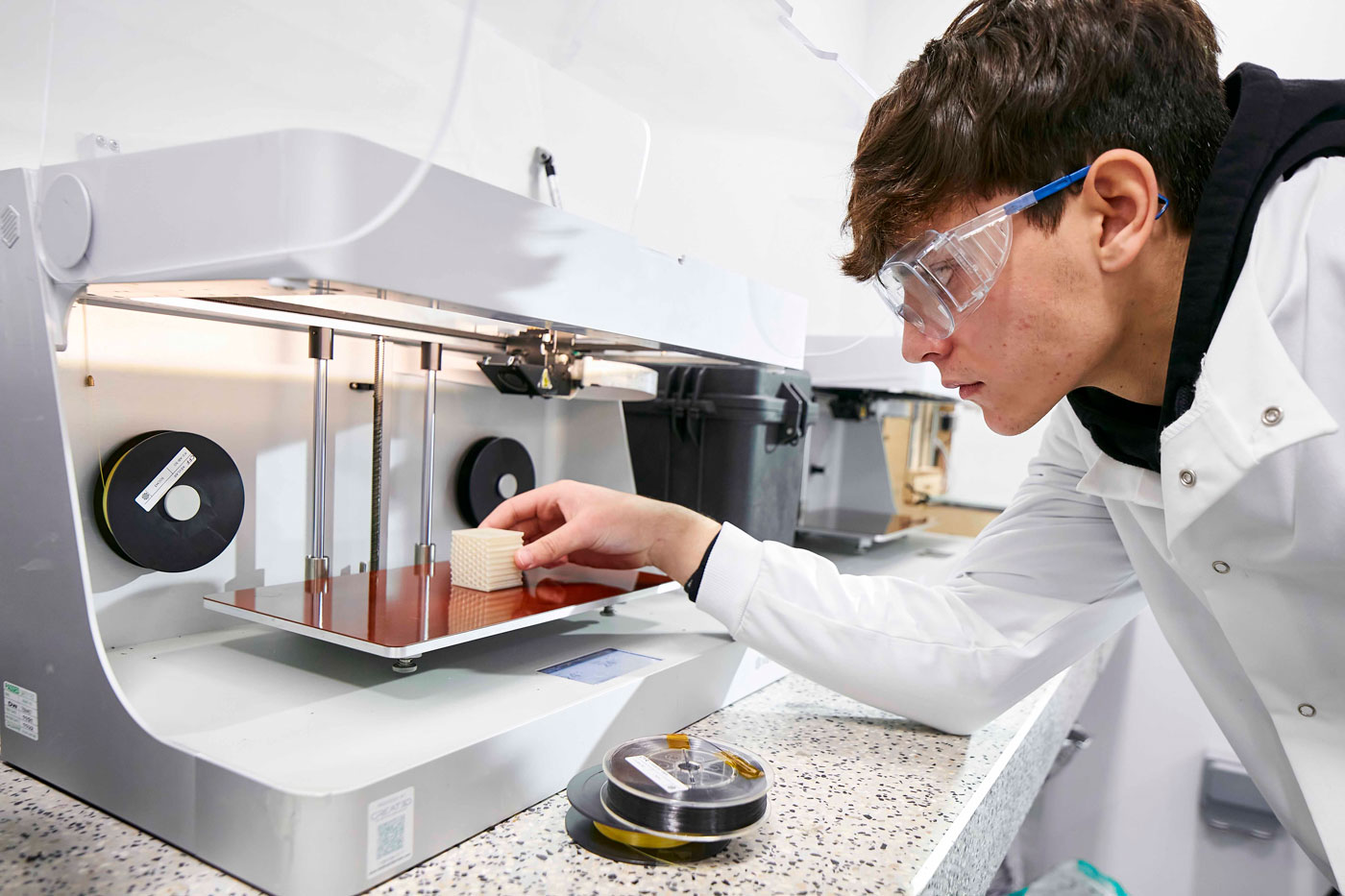 Male student with 3D Printer