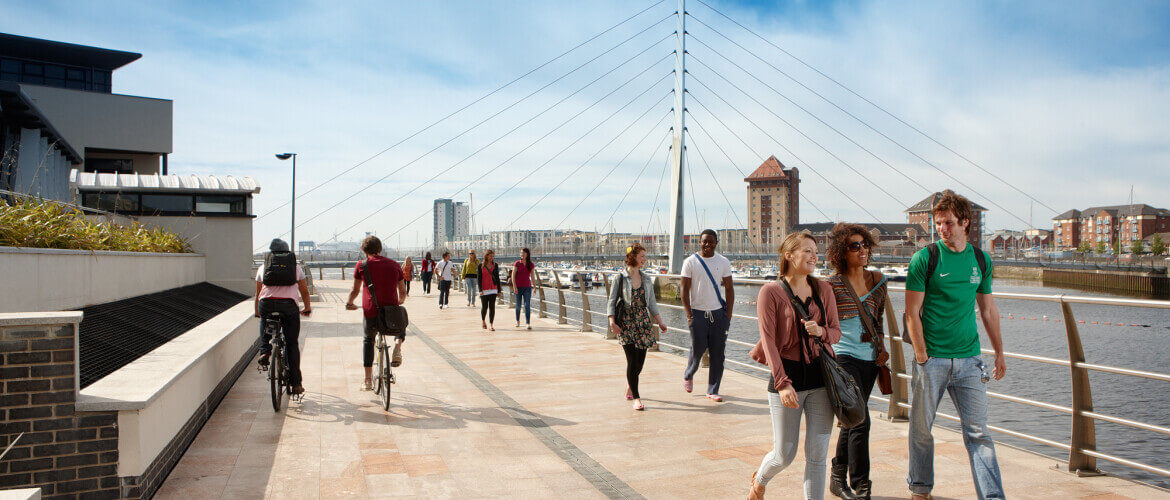 students walking in the marina