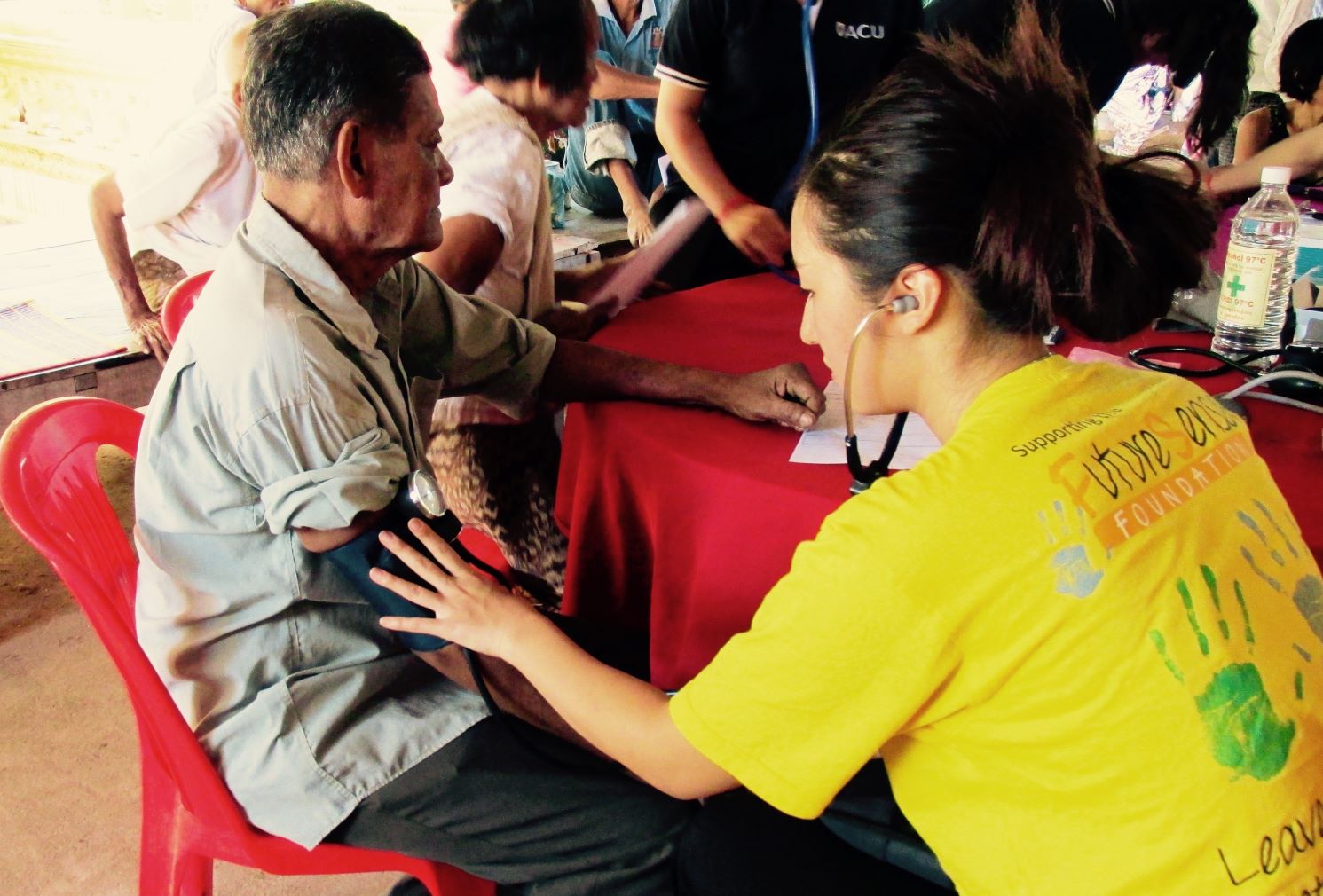 Student doctor treating patient.