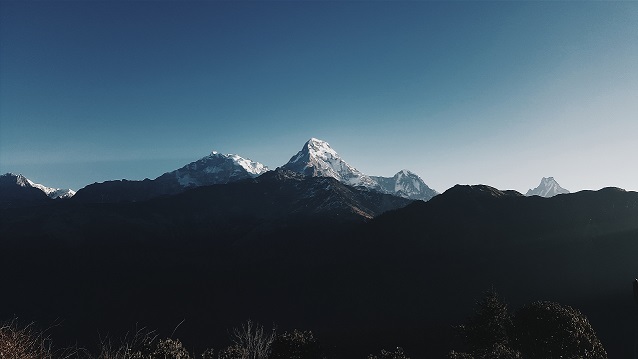 Snow-capped mountains with blue sky