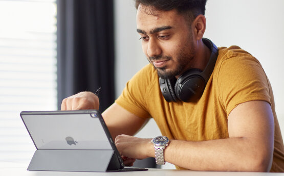 Male student with laptop